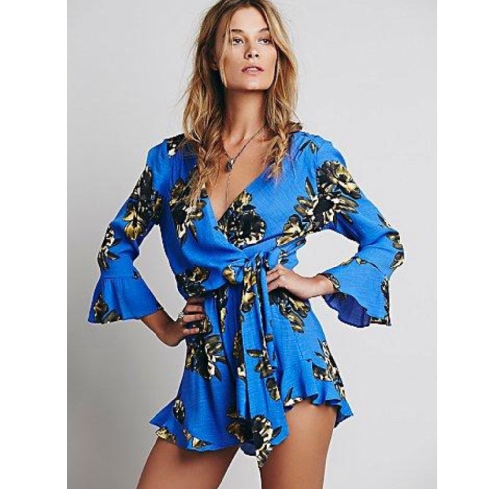 NWOT Free People blue ruffle tie front romper